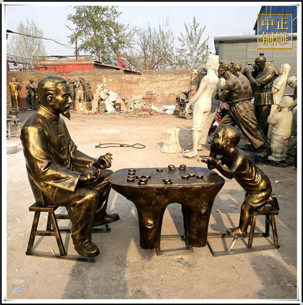 老人孩子下象棋雕塑.jpg 老人孩子下象棋雕塑.jpg
